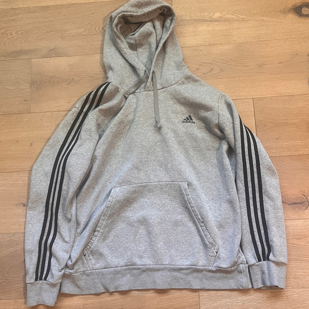 Grey Adidas hoodie with black stripes
